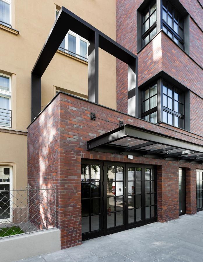 H11 Aparthotel Cracovia Esterno foto The entrance to the house