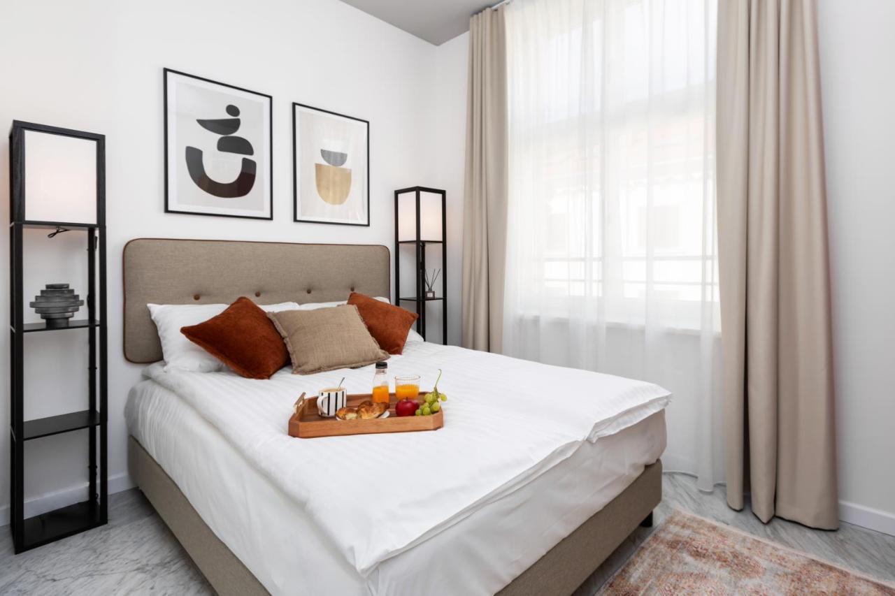 H11 Aparthotel Cracovia Esterno foto A bedroom