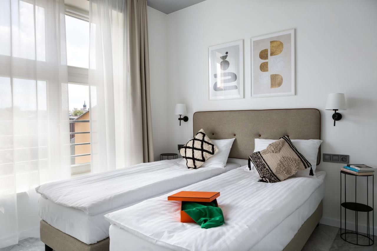 H11 Aparthotel Cracovia Esterno foto A room at the hotel