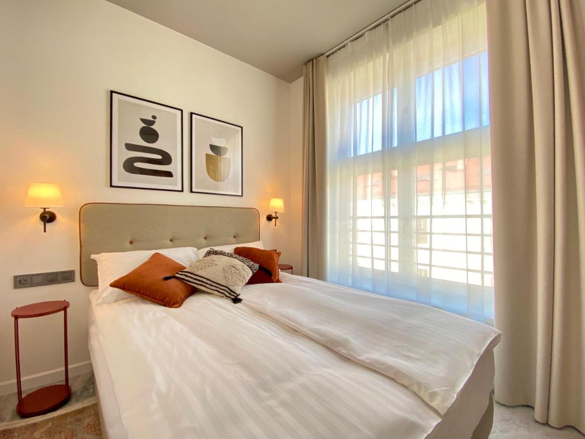 H11 Aparthotel Cracovia Esterno foto A bedroom