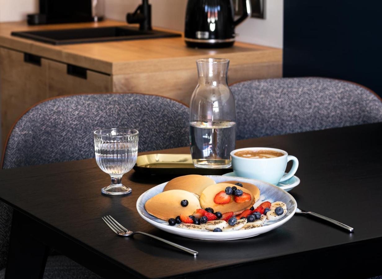 H11 Aparthotel Cracovia Esterno foto A breakfast at the hotel