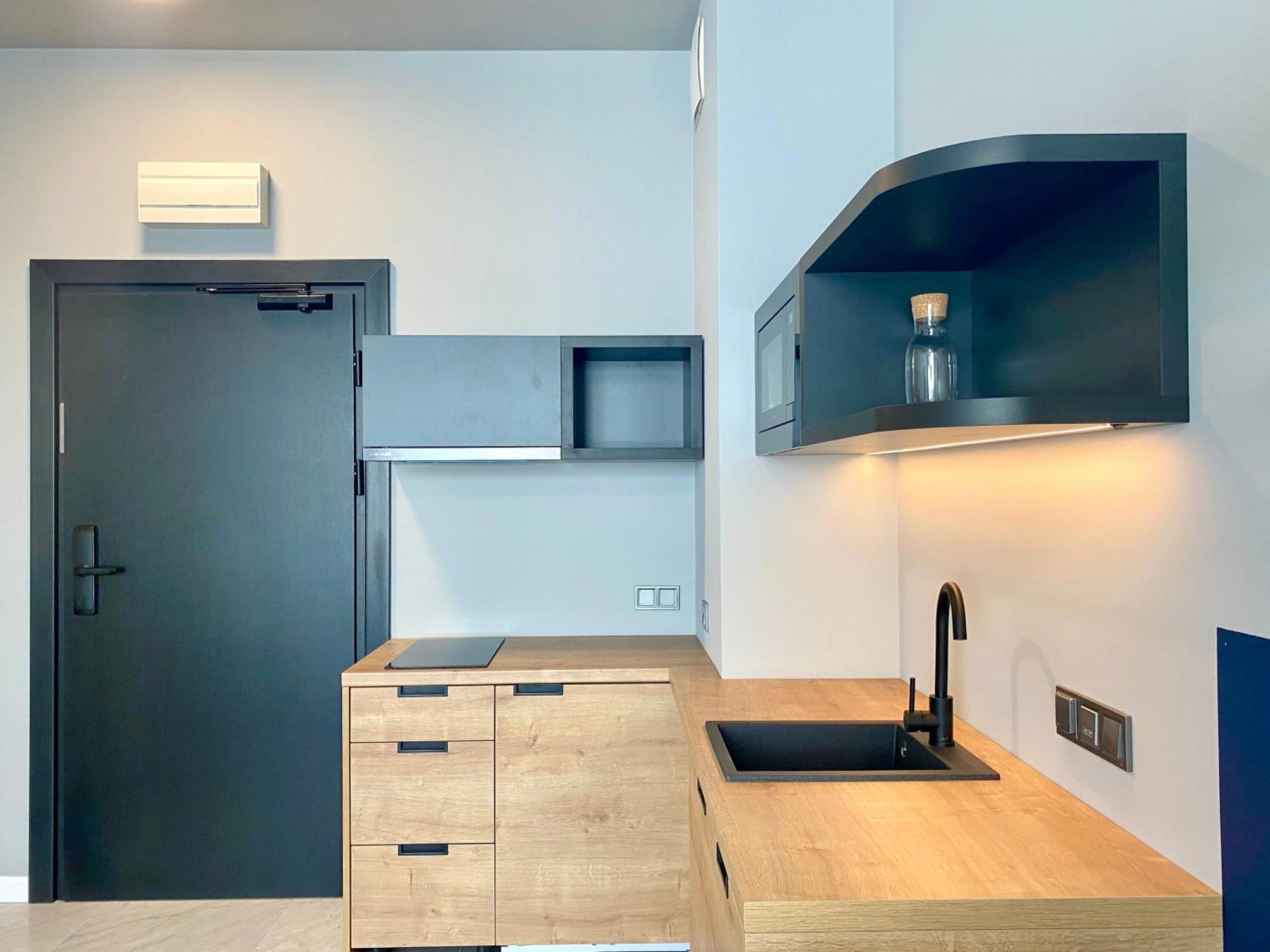 H11 Aparthotel Cracovia Camera foto A kitchenette in a student apartment