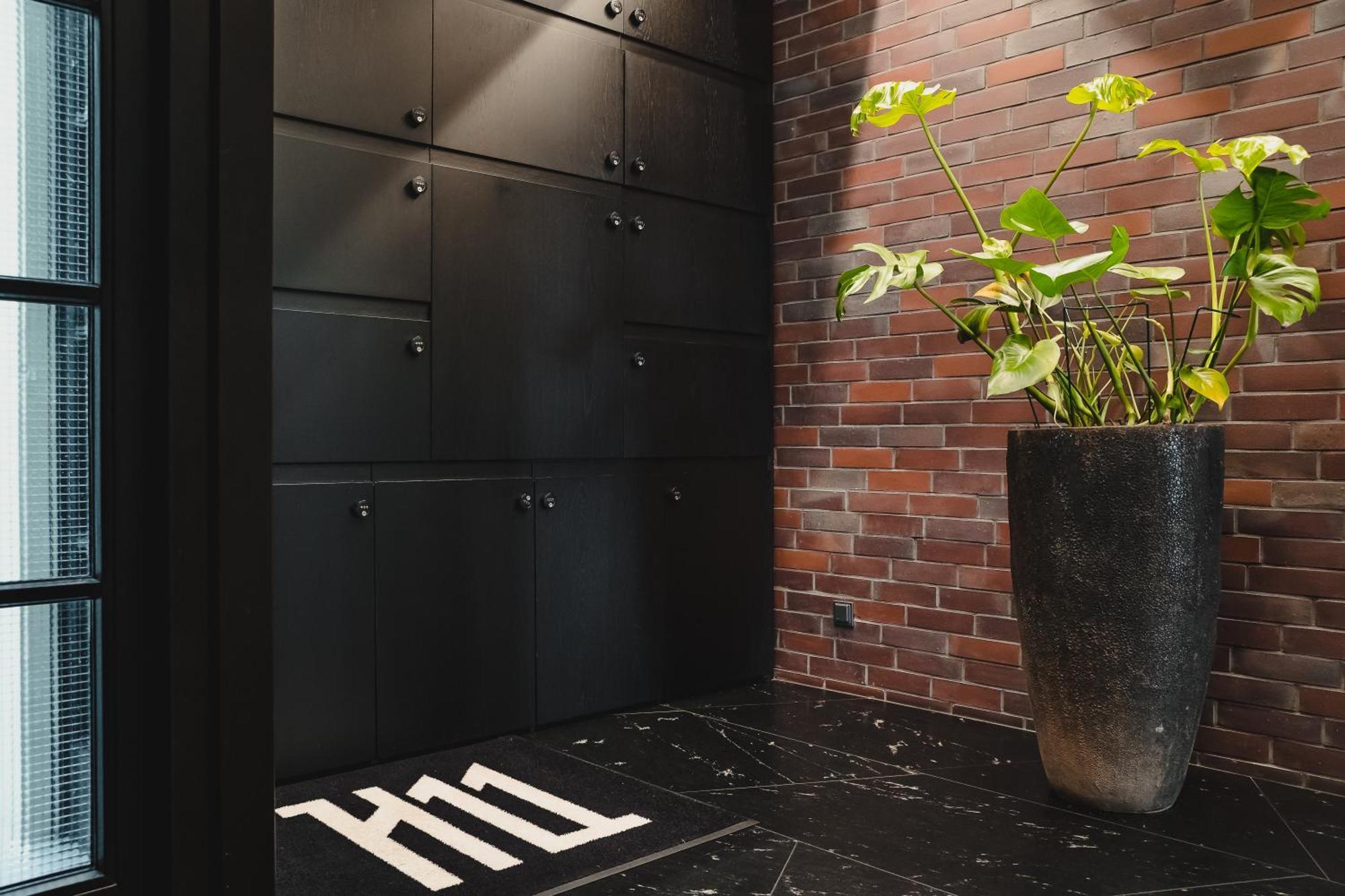 H11 Aparthotel Cracovia Esterno foto A welcome mat