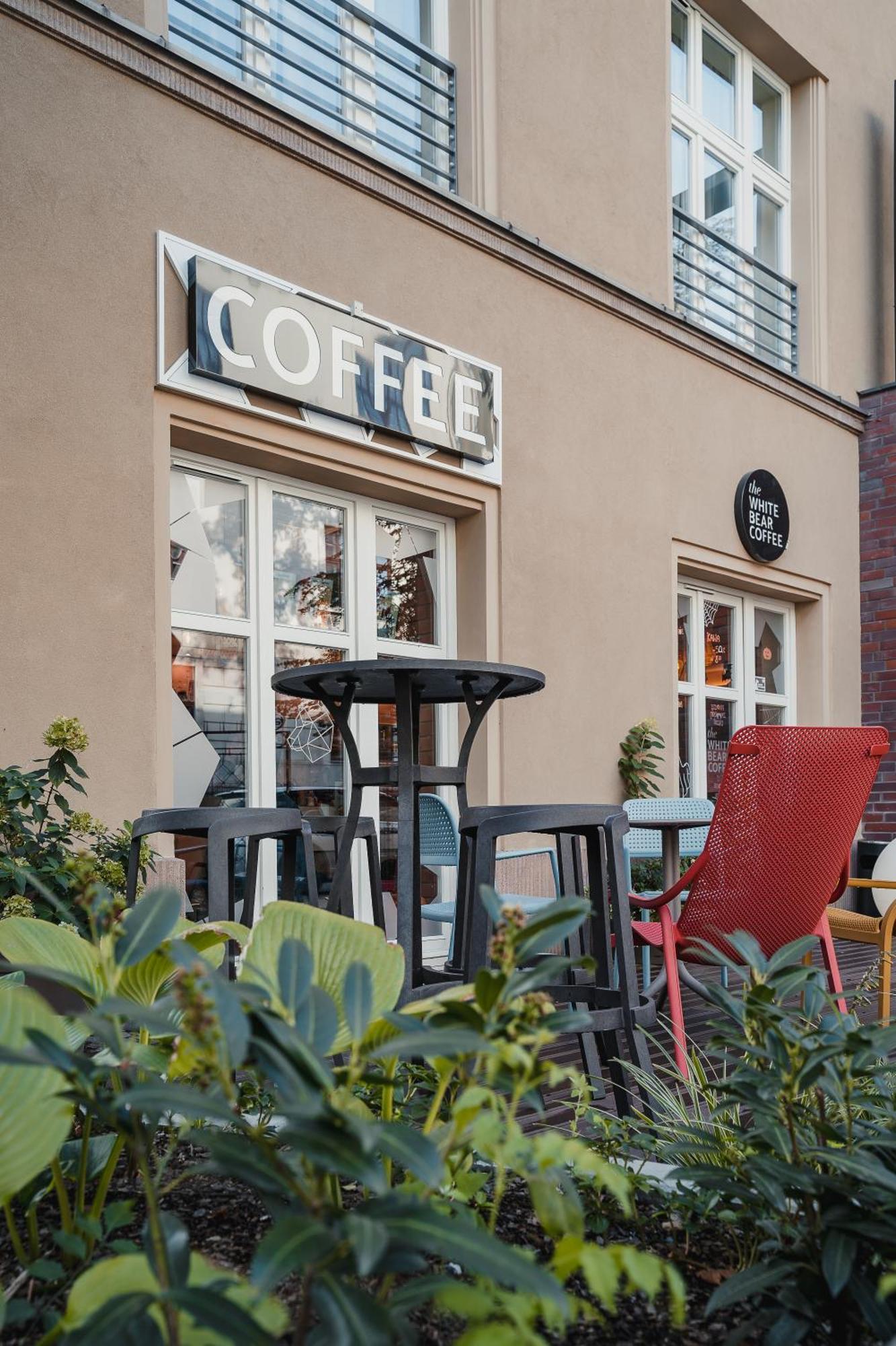 H11 Aparthotel Cracovia Esterno foto A coffee shop in Warsaw, Poland